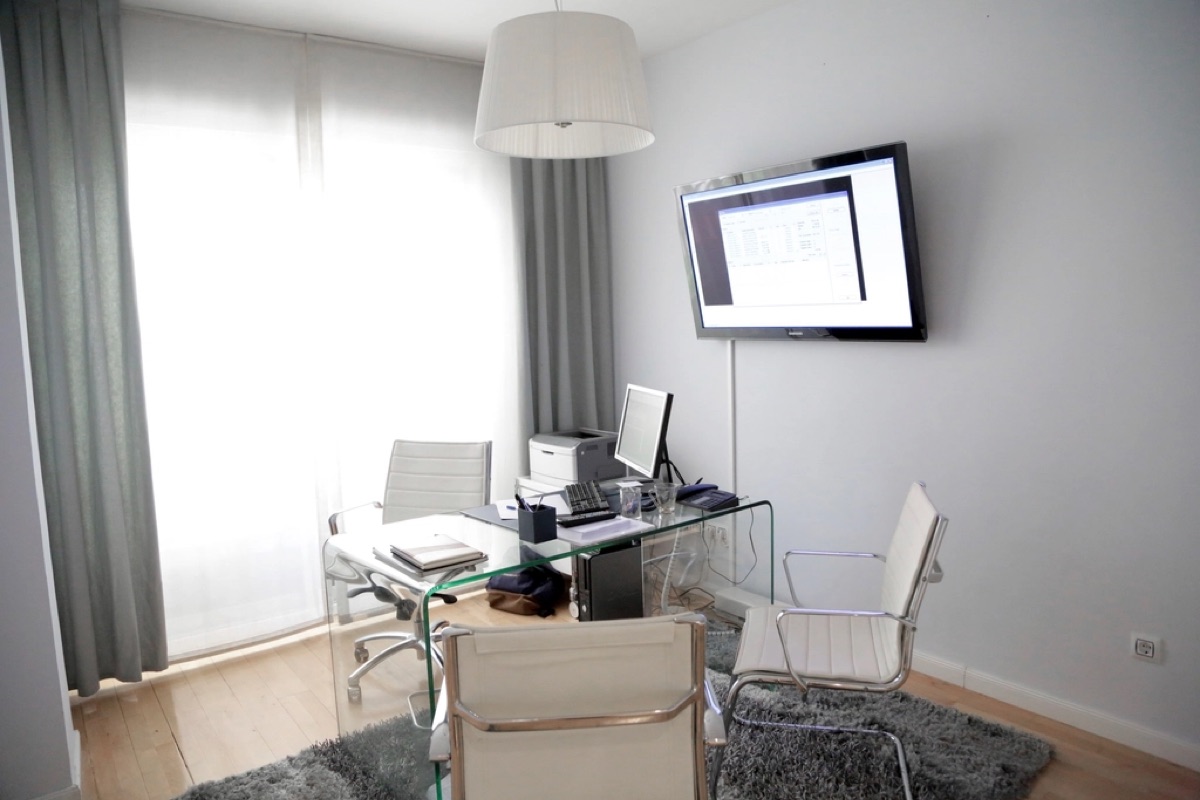 Calm, bright clinic room with sheer curtains